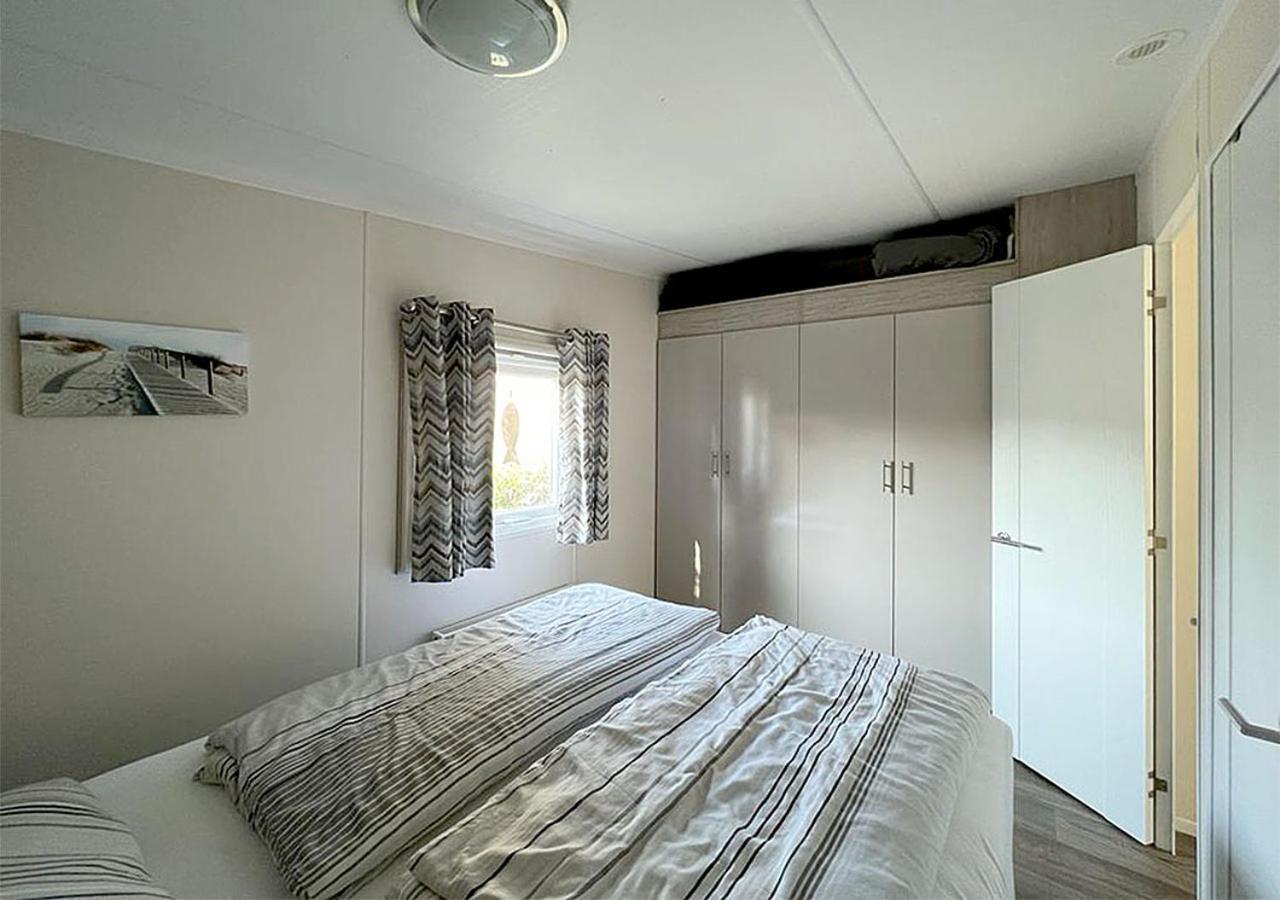 Chalet Am See Lathum Bagian luar foto