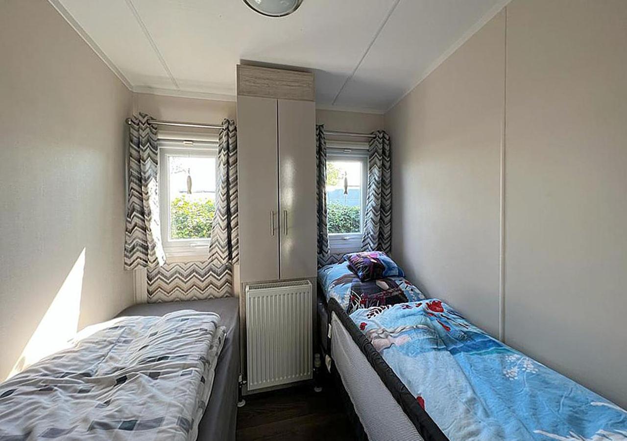 Chalet Am See Lathum Bagian luar foto