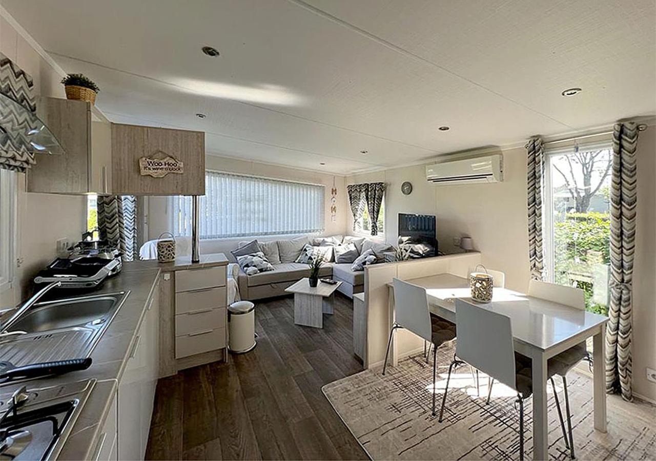 Chalet Am See Lathum Bagian luar foto